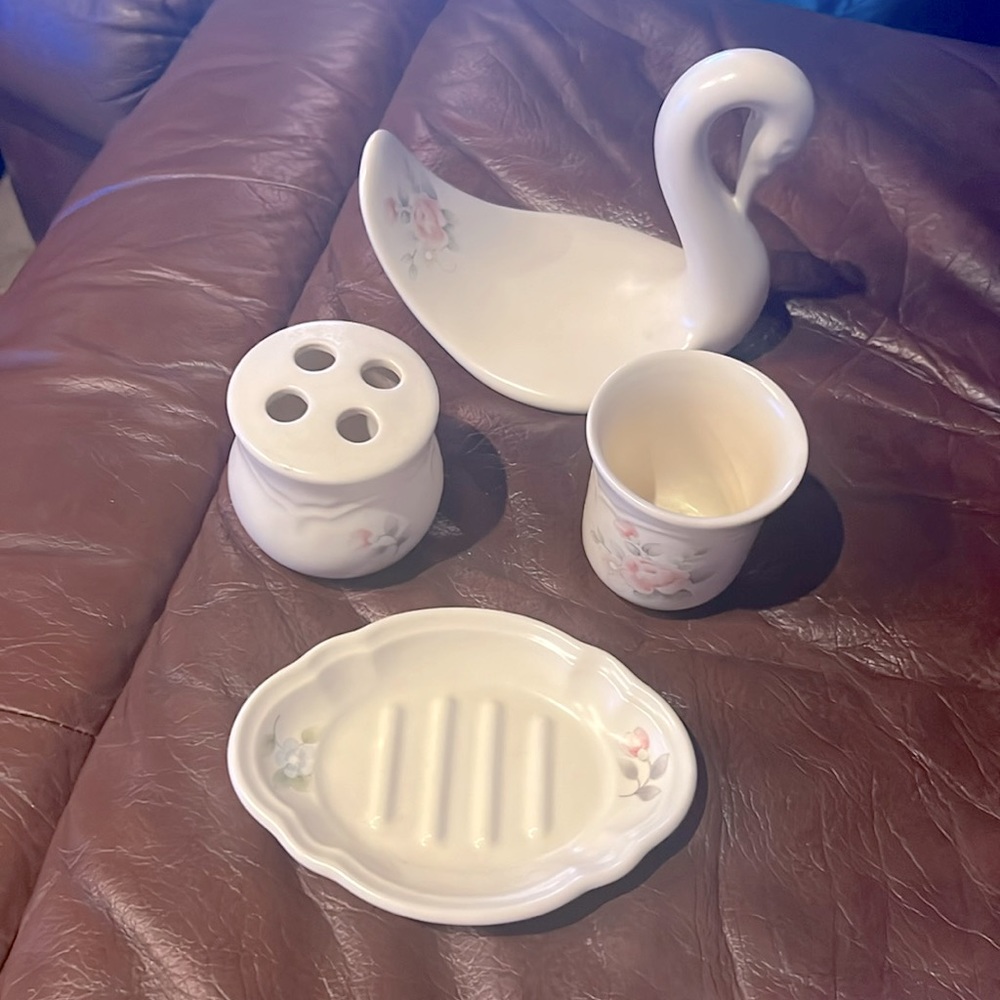 Set of four bathroom accessories